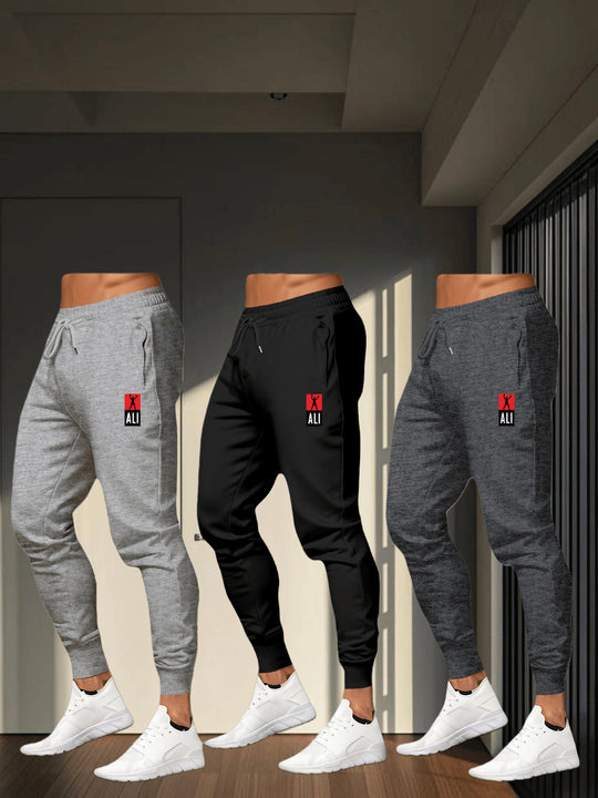 Pack de 3 Pantalones Deportivos para Hombre de Corte Holgado con Cintura Elástica y Cordón, Diseño con Dobladillo en el Tobillo - Joggers de Poliéster Resistente Ideales para Entrenamiento, Lavables a Máquina, Ropa de Gimnasio para Invierno (Paquete de 3