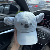 Gorro de Orejas Ajustable con Diseño Koala y Huella - Gorra Suave para Fiestas, Azul Pastel/Gris, Ligero Para Uso Casual o como Accesorio Temático Regalo