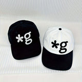 Gorra de béisbol con flor bordada, parte superior suave, diseño que adelgaza la cara para hombres y mujeres, colección de primavera y verano, negro y blanco, ajuste ajustable, gorra de béisbol