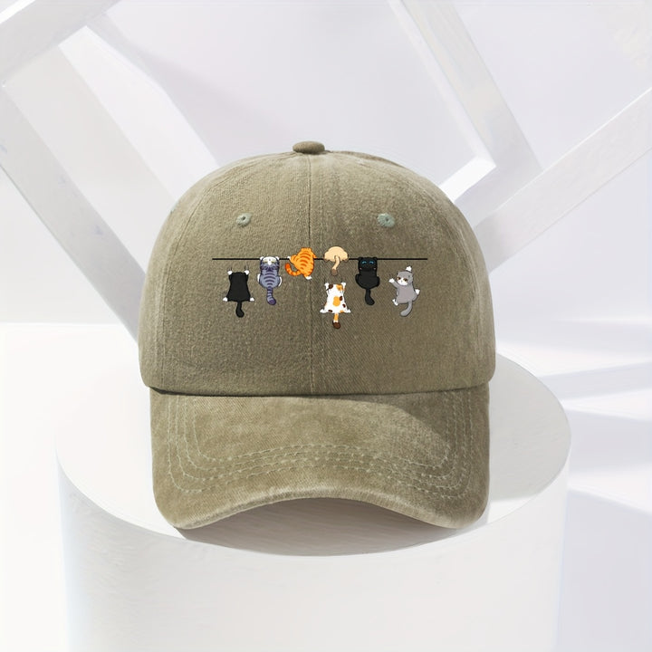Tela. Adorable gorra de béisbol con temática felina, perfecta para la moda urbana, con un diseño divertido y vibrante adecuado para cualquier temporada.