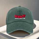 Gorra de béisbol ajustable del proyecto Nude - Ligera, lavable a mano, cierre de snapback, negra con diseño de texto rojo cereza y blanco, perfecta para viajes al aire libre y Halloween, accesorios de Halloween | Diseño juguetón | Gorra ligera