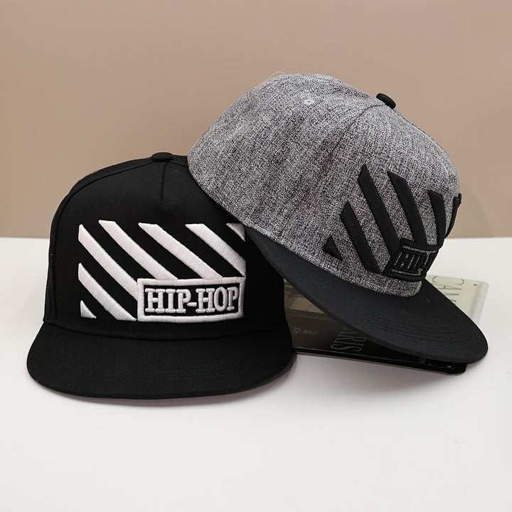 Una pieza de gorra de béisbol de malla negra neutral con estampado de hip-hop, diseñada para hombres y mujeres, perfecta para la moda al aire libre casual y adecuada para deportes bajo el sol.