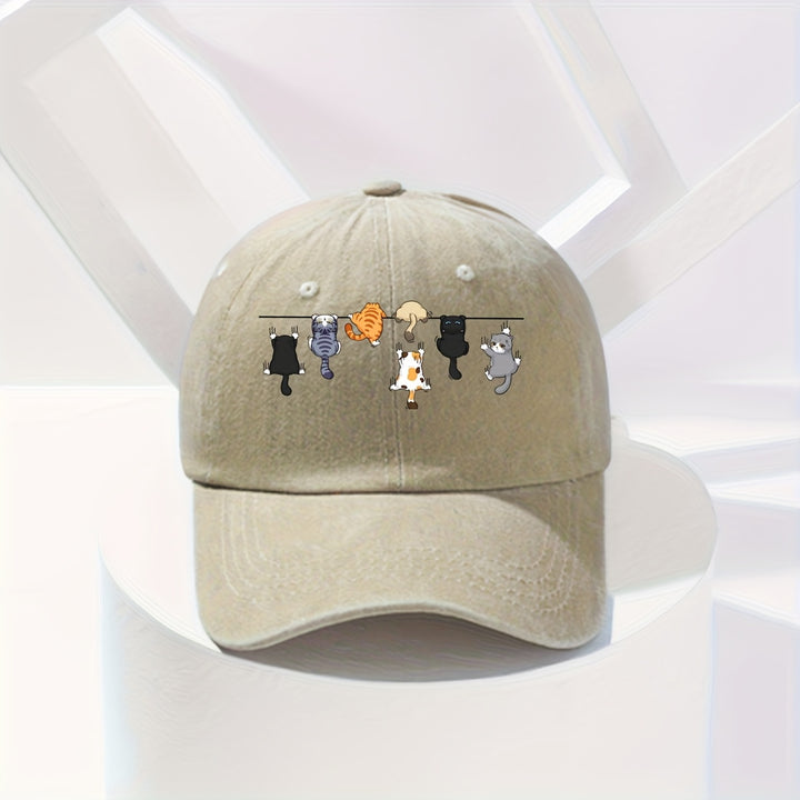 Tela. Adorable gorra de béisbol con temática felina, perfecta para la moda urbana, con un diseño divertido y vibrante adecuado para cualquier temporada.